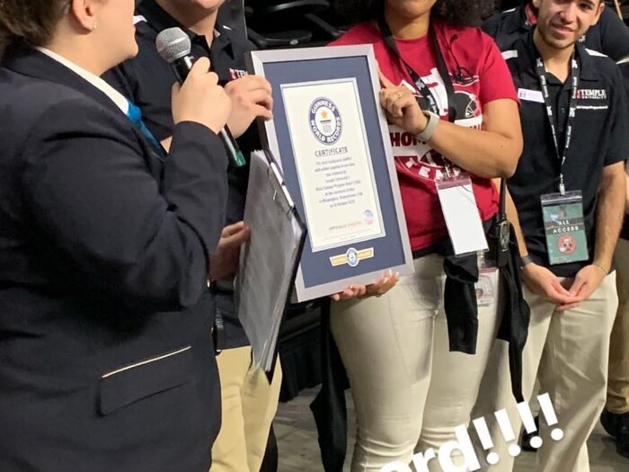 Accepting a Guinness World Record certificate