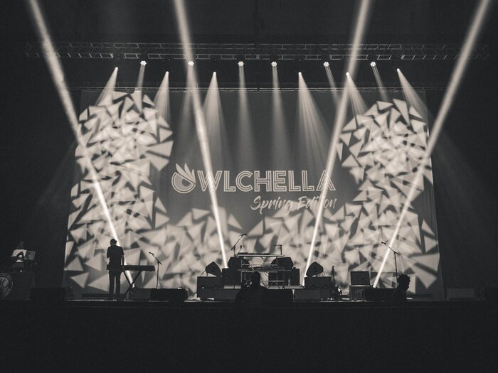 Owlchella concert stage lit with spotlights